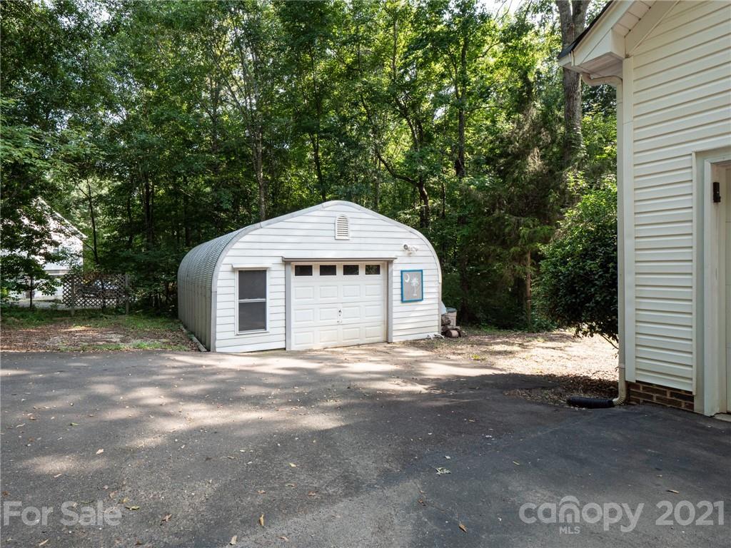 9141 Sunrise Meadow Road Fort Mill, SC 29715 - Photo 40 of 45 a front view of a house with a yard