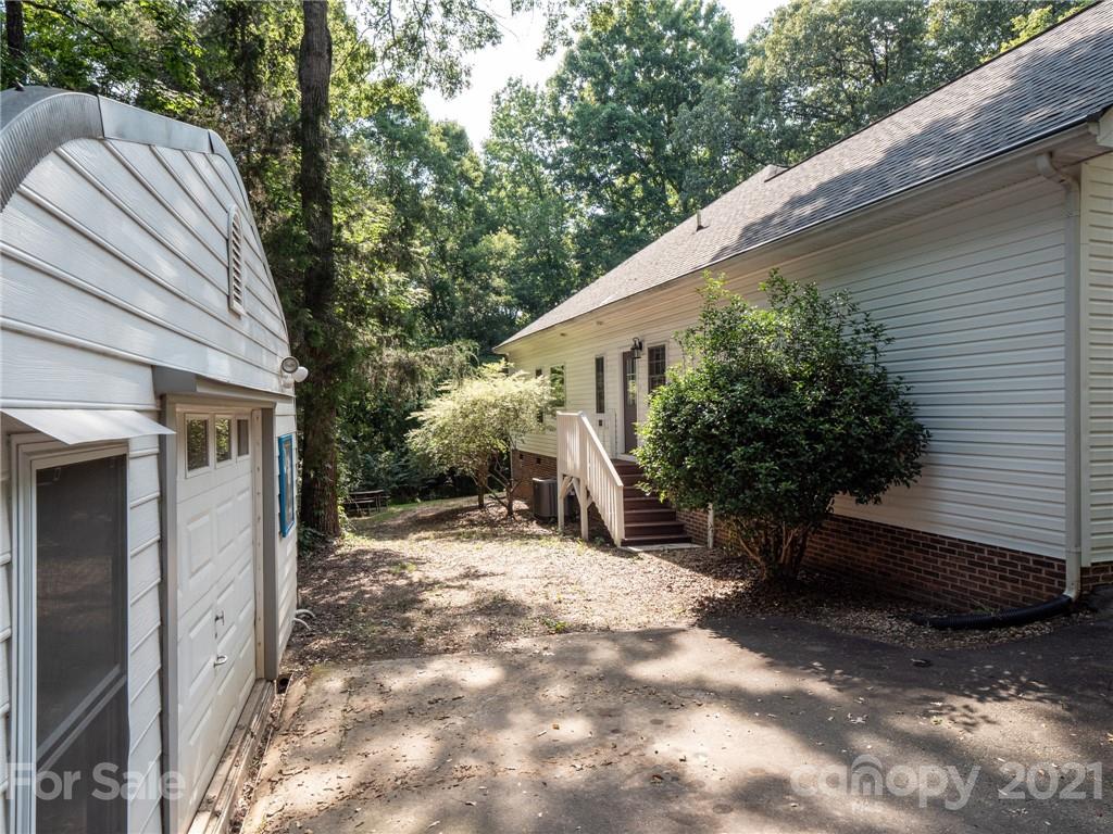 9141 Sunrise Meadow Road Fort Mill, SC 29715 - Photo 41 of 45 a view of a house with a yard