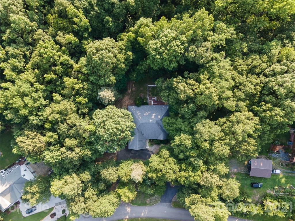 9141 Sunrise Meadow Road Fort Mill, SC 29715 - Photo 42 of 45 a view of a house with a flower garden