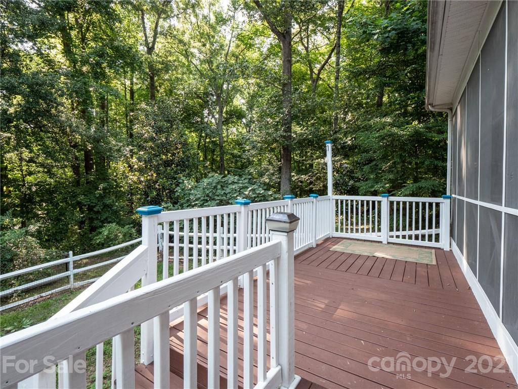 9141 Sunrise Meadow Road Fort Mill, SC 29715 - Photo 6 of 45 a view of a wooden roof deck