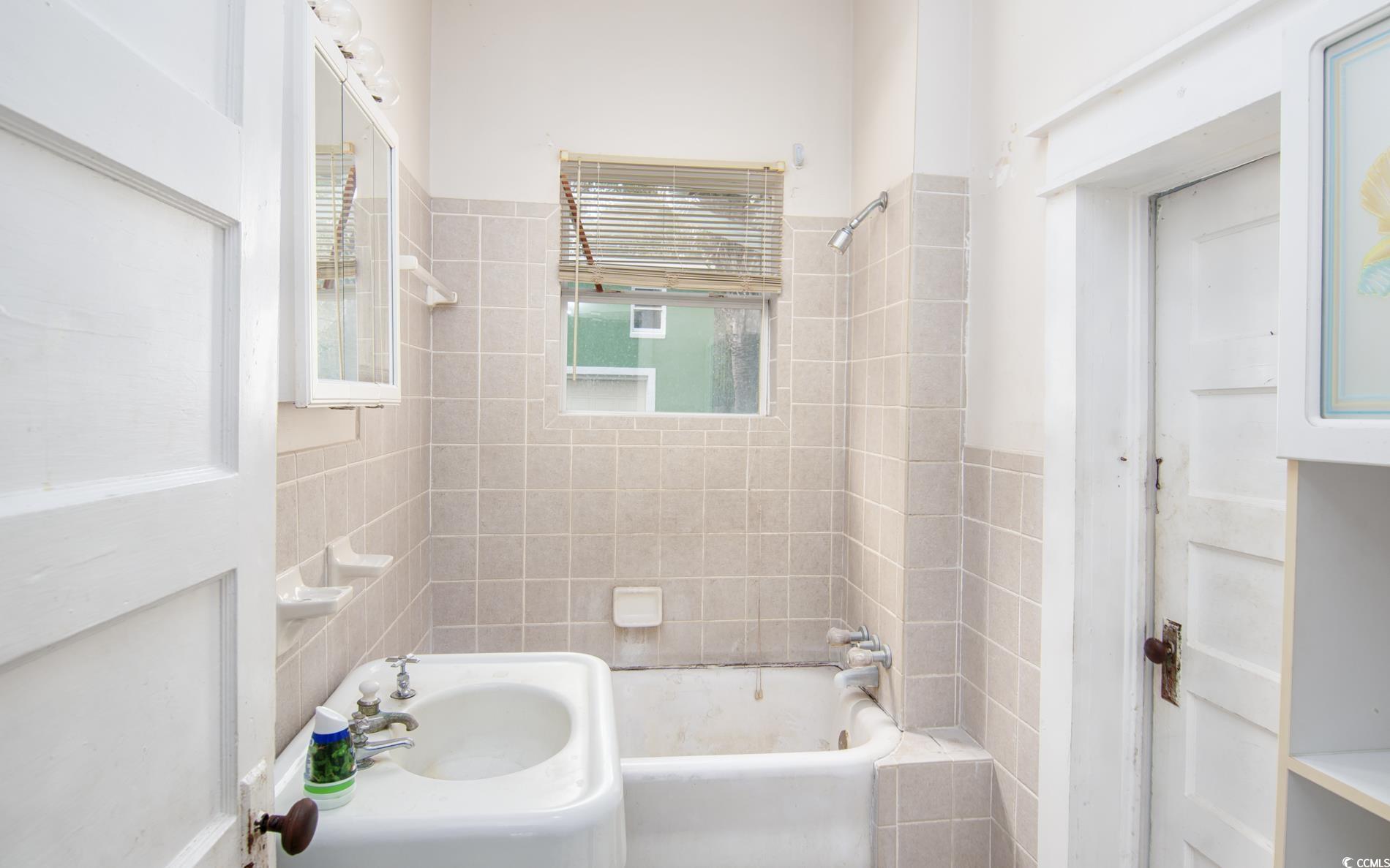 1019 Prince Street Georgetown, SC 29440 - Photo 12 of 22 Full bath featuring tub / shower combination and a sink