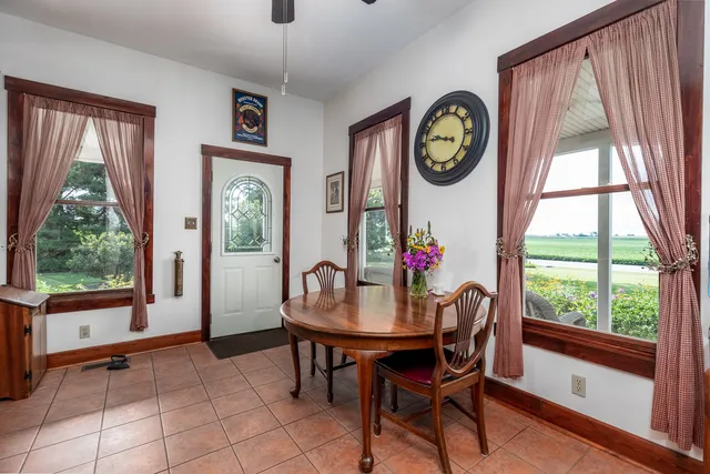 a bedroom with a bed and a mirror