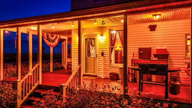 a living room with furniture flat screen tv and wooden floor