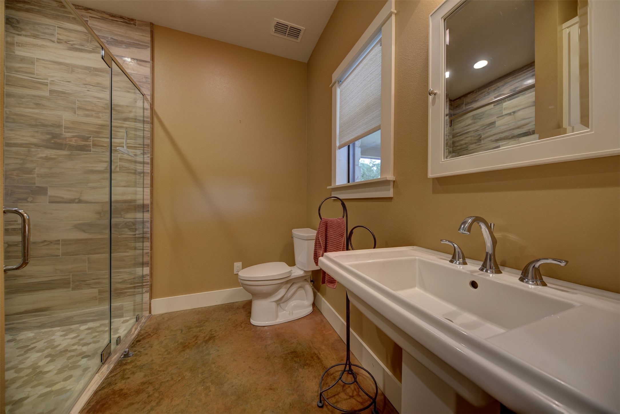 2003 Oak Ridge Road Weimar, TX 78962 - Photo 14 of 35 a bathroom with a sink a toilet and shower