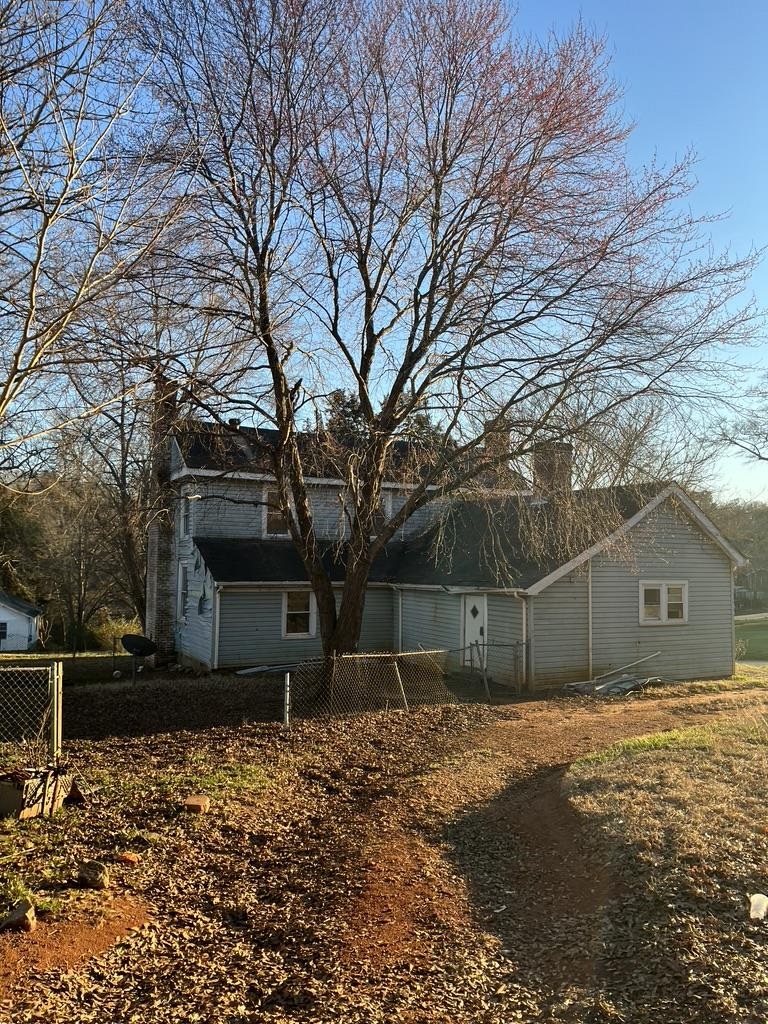 10311 Main Street Fingerville, SC 29349 - Photo 2 of 23 Driveway behind the house