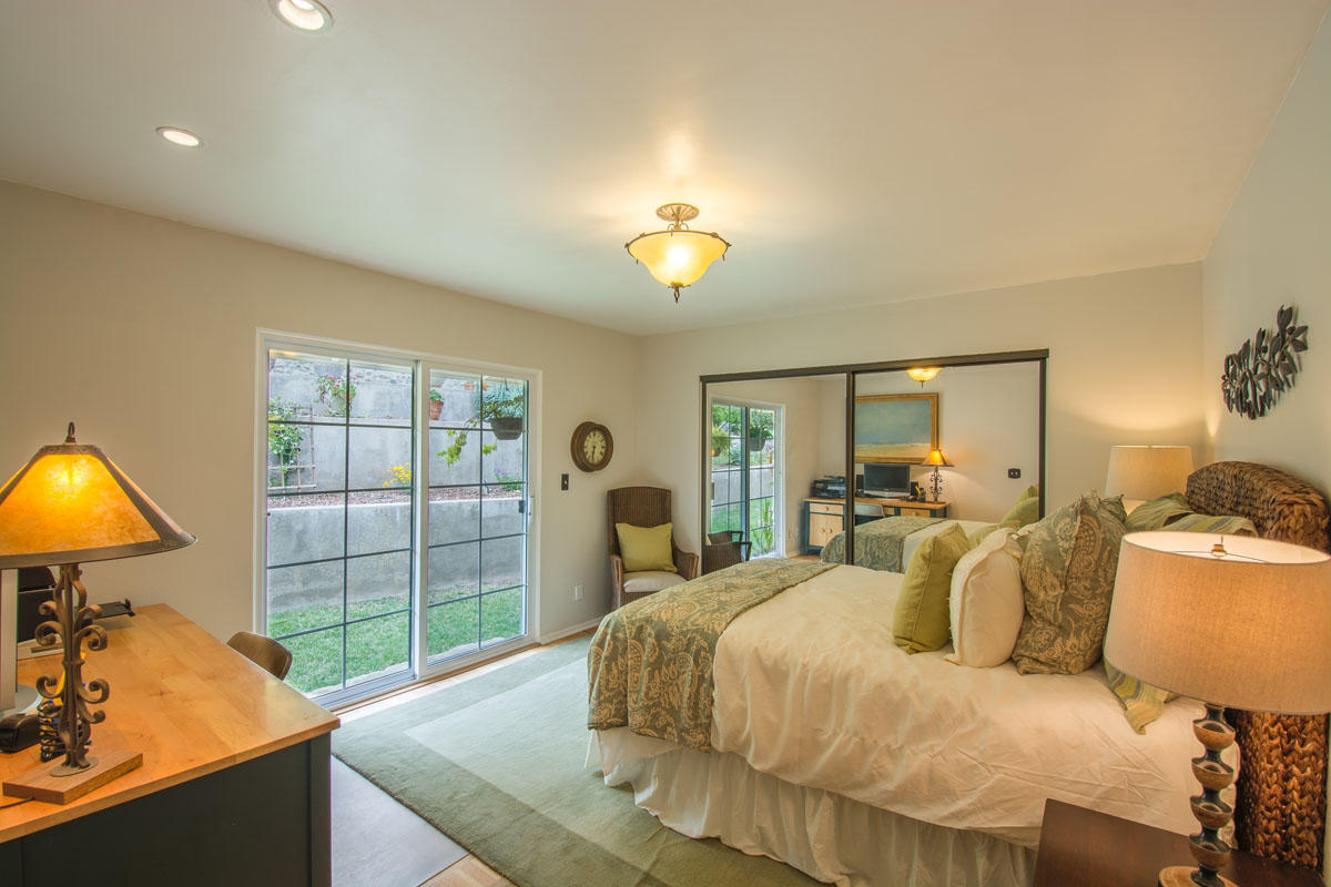 511 Fellowship Road Santa Barbara, CA 93109 - Photo 14 of 24 a bedroom with a bed and a window