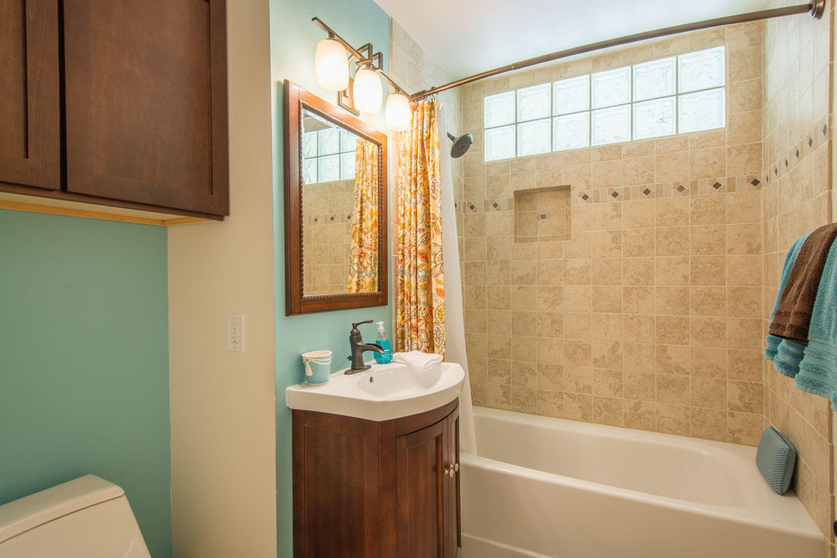 511 Fellowship Road Santa Barbara, CA 93109 - Photo 15 of 24 a bathroom with a bathtub a sink and a shower