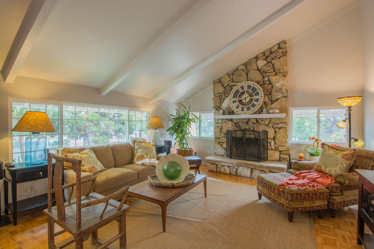 511 Fellowship Road Santa Barbara, CA 93109 - Photo 4 of 24 a living room with furniture and a fireplace