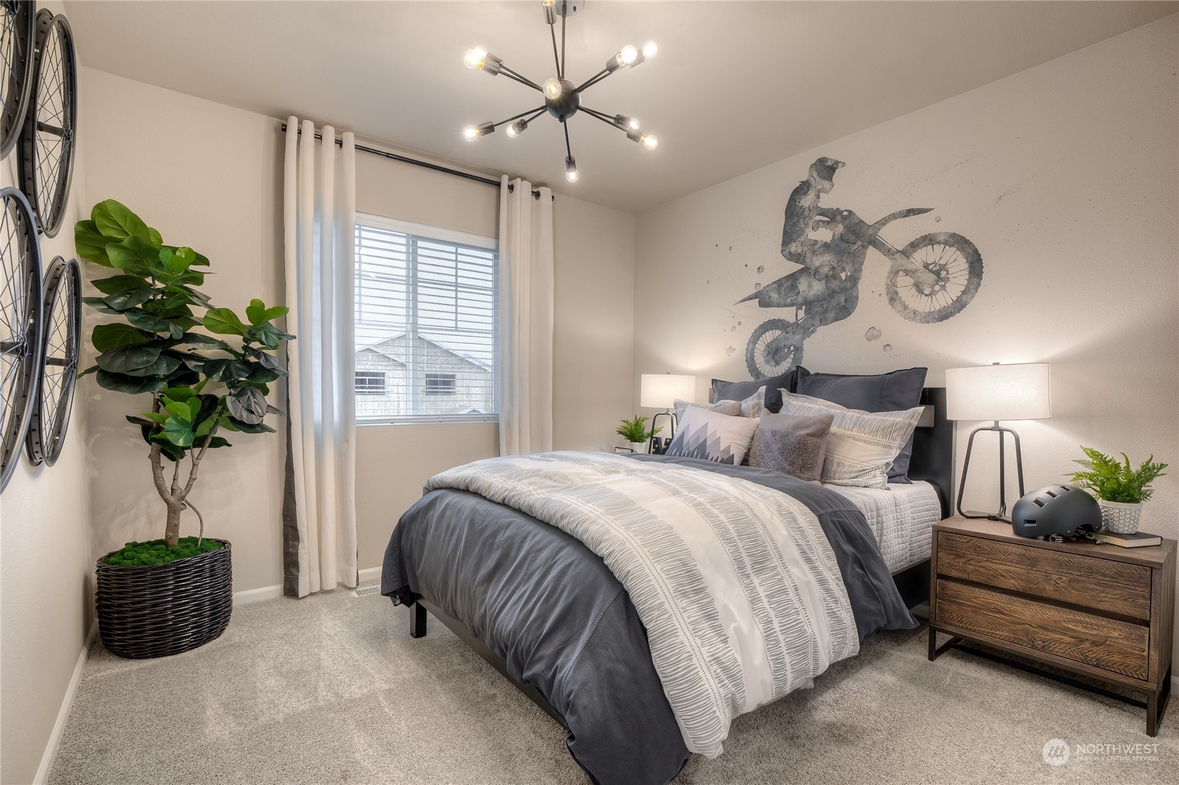 909 17th Avenue, Unit 159 Sultan, WA 98294 - Photo 8 of 15 a bedroom with bed and a potted plant