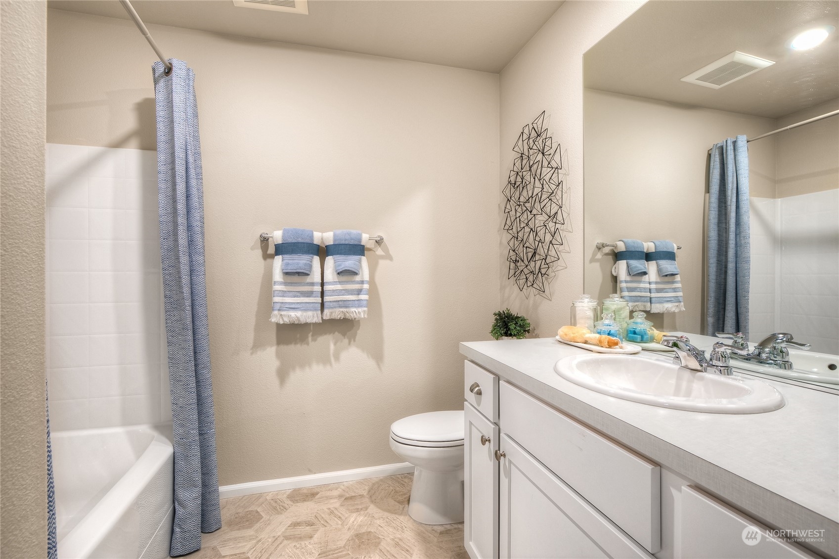 909 17th Avenue, Unit 159 Sultan, WA 98294 - Photo 9 of 15 a bathroom with a sink toilet and shower
