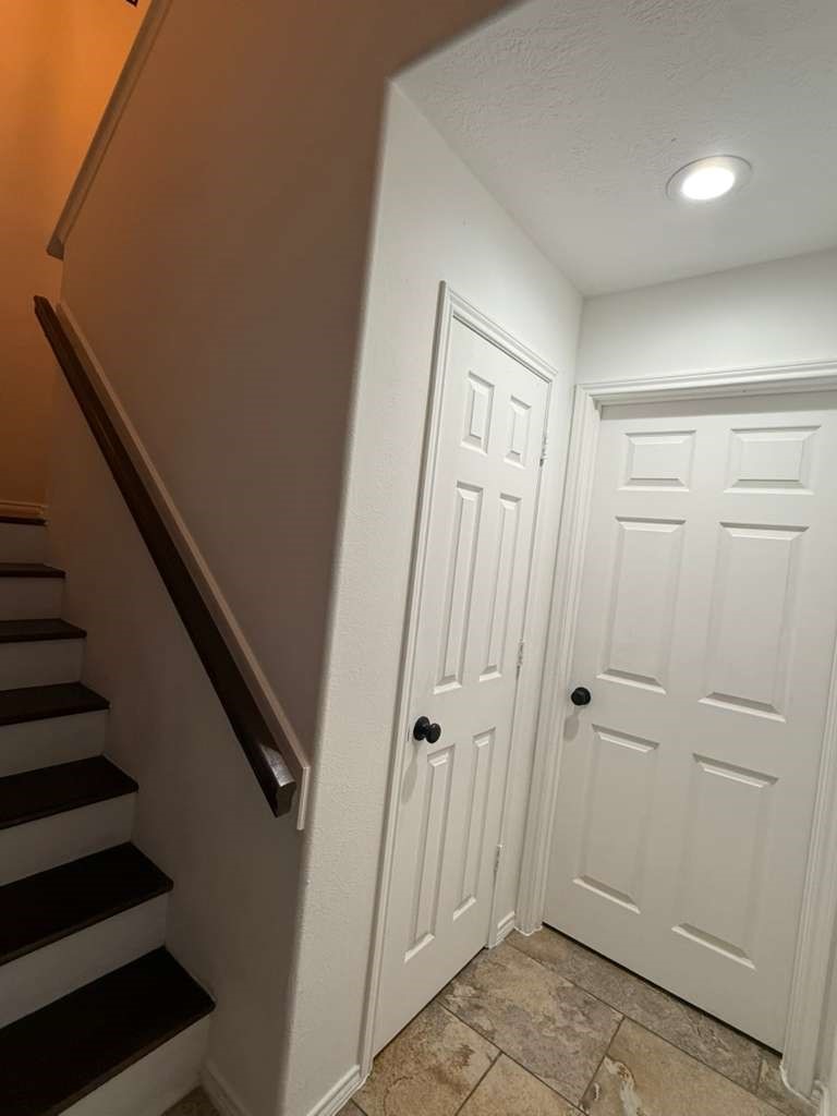 1011 Backland Court Spring, TX 77373 - Photo 16 of 35 a view of a hallway with entryway wooden floor and front door