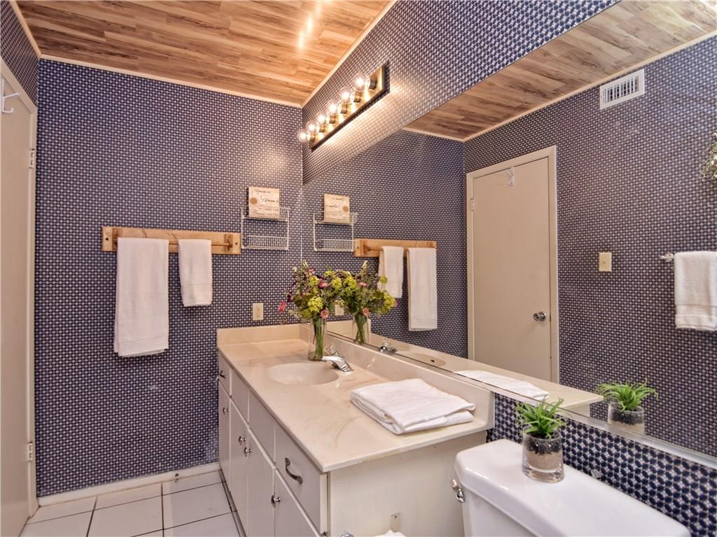 910 Duncan Lane, Unit 2 Austin, TX 78705 - Photo 6 of 11 Refined bathroom with an inviting vanity, complete with dual sinks.