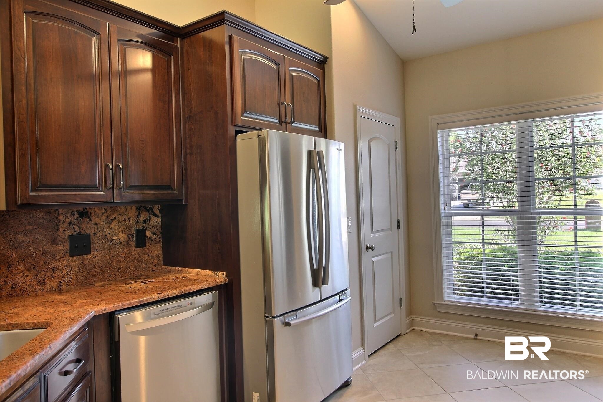 32891 Arbor Ridge Circle Lillian, AL 36549 - Photo 10 of 37 Dishwasher, Refg. Pantry and windows in Kitchen