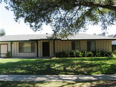 2220 South Rice Road Ojai, CA 93023 - Photo 1 of 7 a front view of house with yard and green space