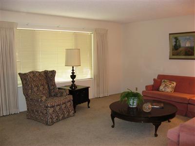 2220 South Rice Road Ojai, CA 93023 - Photo 2 of 7 a living room with furniture and a potted plant