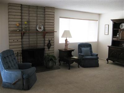 2220 South Rice Road Ojai, CA 93023 - Photo 4 of 7 a living room with furniture and a fireplace