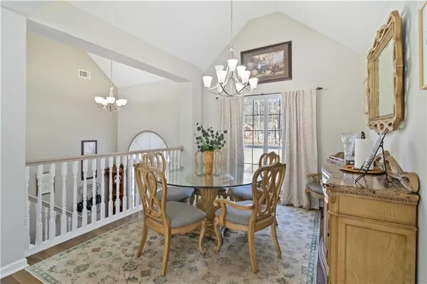 a kitchen with stainless steel appliances a refrigerator sink and stove