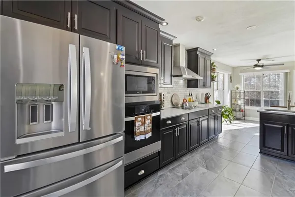 a outdoor space with patio furniture and wooden floor