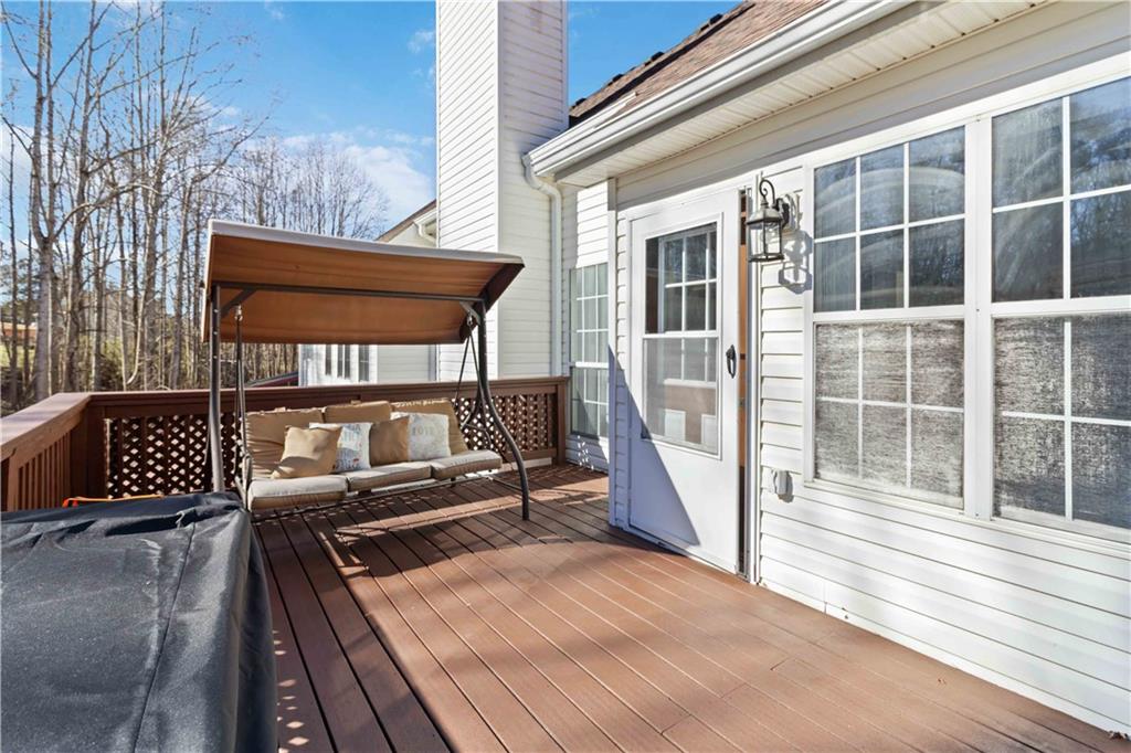 180 Harper Road McDonough, GA 30252 - Photo 28 of 63 a view of a balcony with two chairs and wooden floor