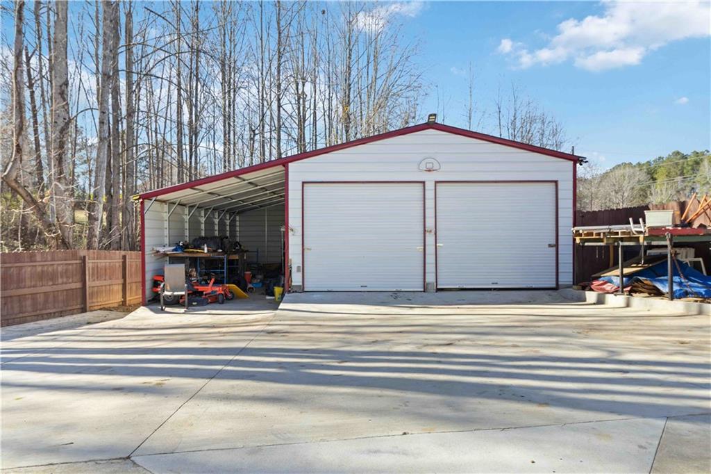 180 Harper Road McDonough, GA 30252 - Photo 29 of 63 a view of outdoor space and front view of a house