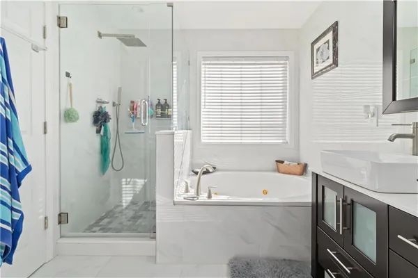 a view of a swimming pool with an outdoor seating