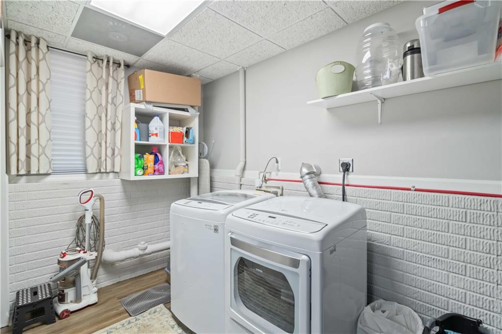 180 Harper Road McDonough, GA 30252 - Photo 44 of 63 a utility room with dryer and washer