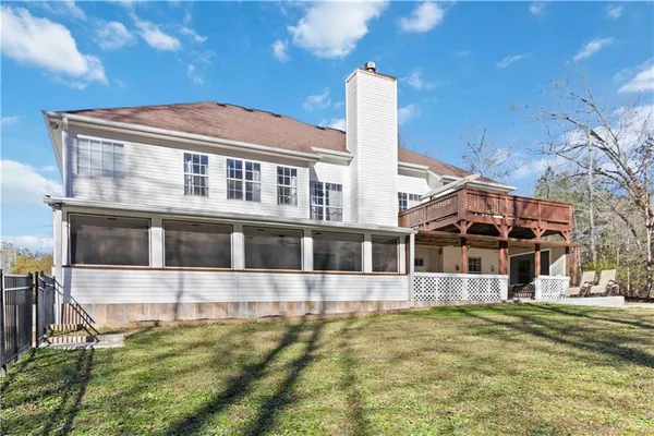 a backyard of a house with lots of green space