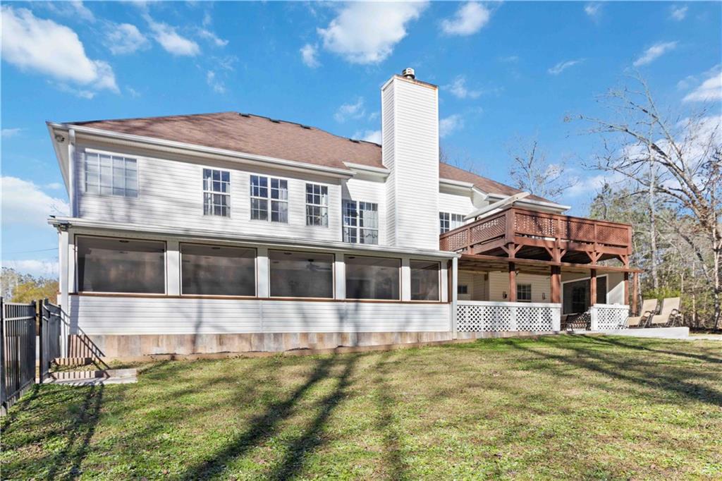 180 Harper Road McDonough, GA 30252 - Photo 46 of 63 a front view of a house with a yard