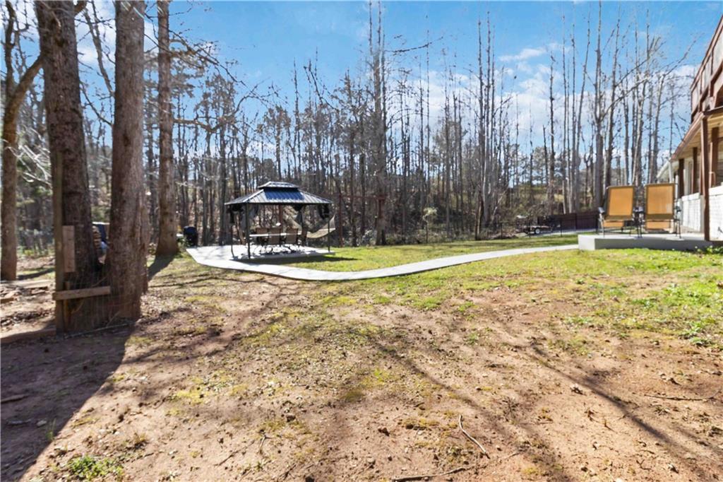 180 Harper Road McDonough, GA 30252 - Photo 48 of 63 a view of a yard with swimming pool