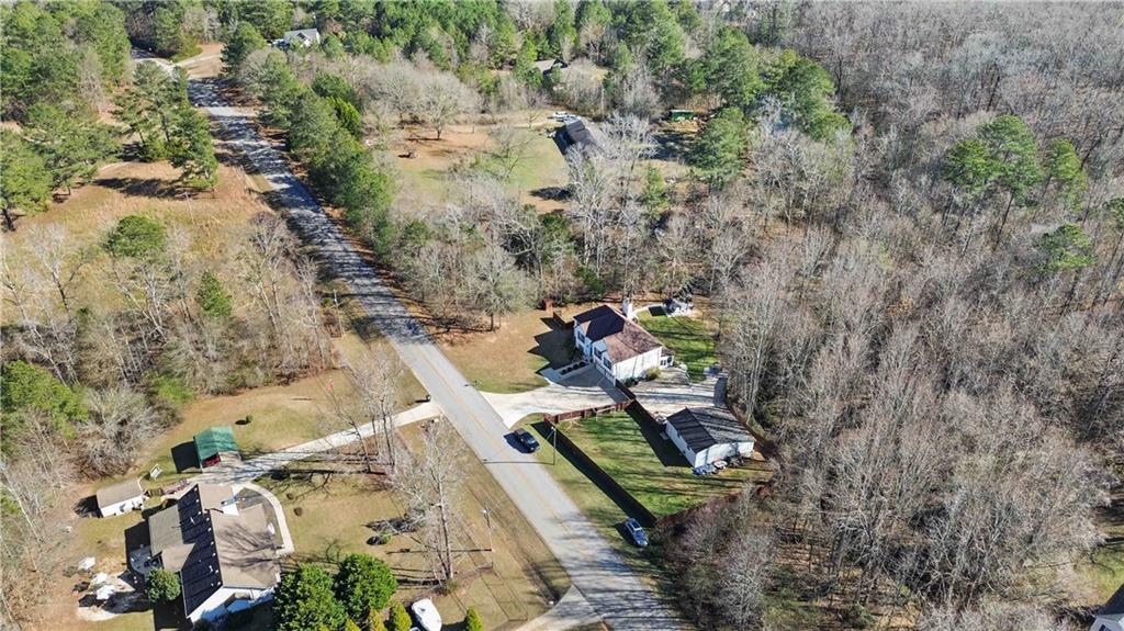 180 Harper Road McDonough, GA 30252 - Photo 56 of 63 a backyard of a house with lots of green space