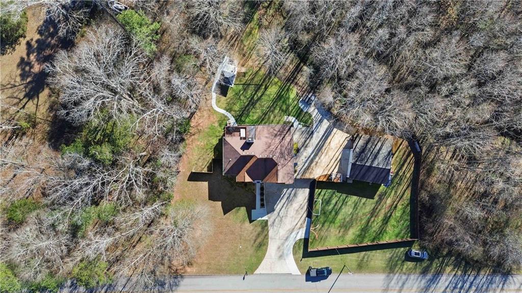 180 Harper Road McDonough, GA 30252 - Photo 57 of 63 an aerial view of houses with yard