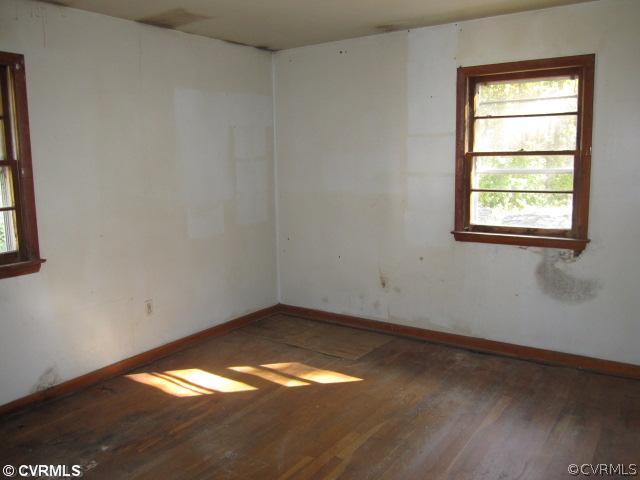 7712 Woodpecker Road Chesterfield, VA 23838 - Photo 5 of 10 an empty room with a window