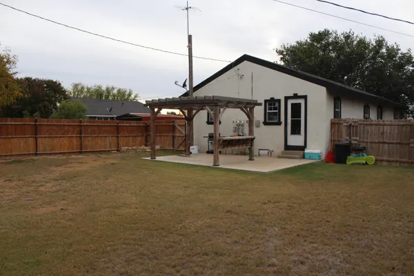 a house view with a outdoor space