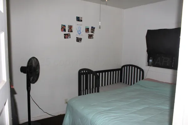 a view of a hallway with storage space