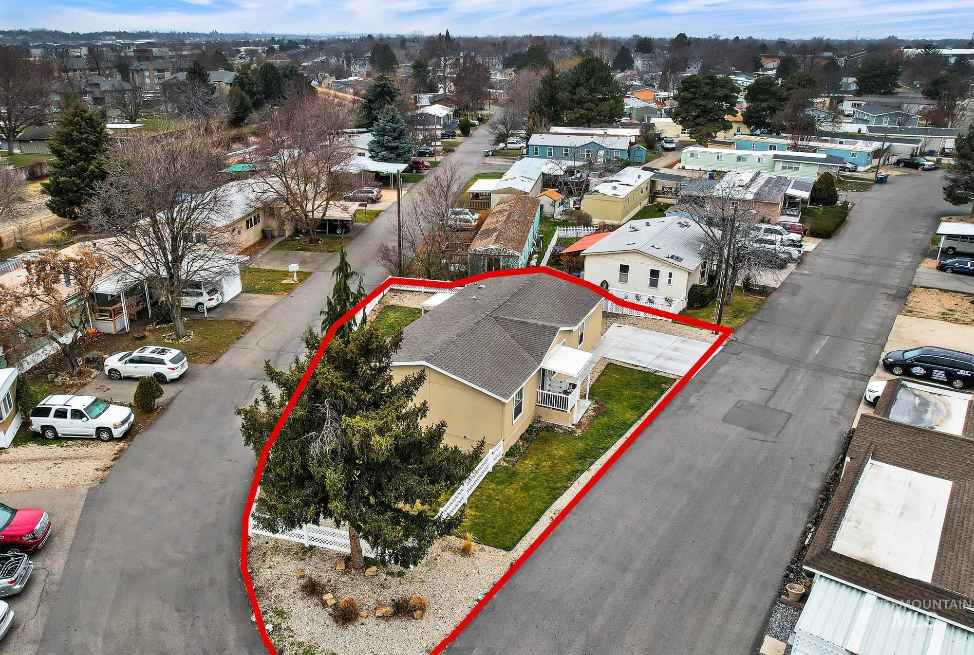 8483 West Irving Lane Boise, ID 83704 - Photo 34 of 40 Aerial perspective of suburban area with property boundaries highlighted