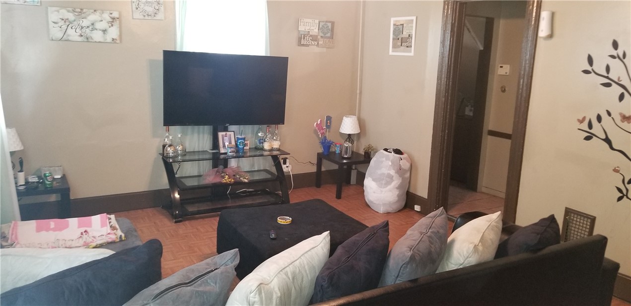 61 Oakman Street Rochester, NY 14605 - Photo 2 of 11 Unit Down Living Room