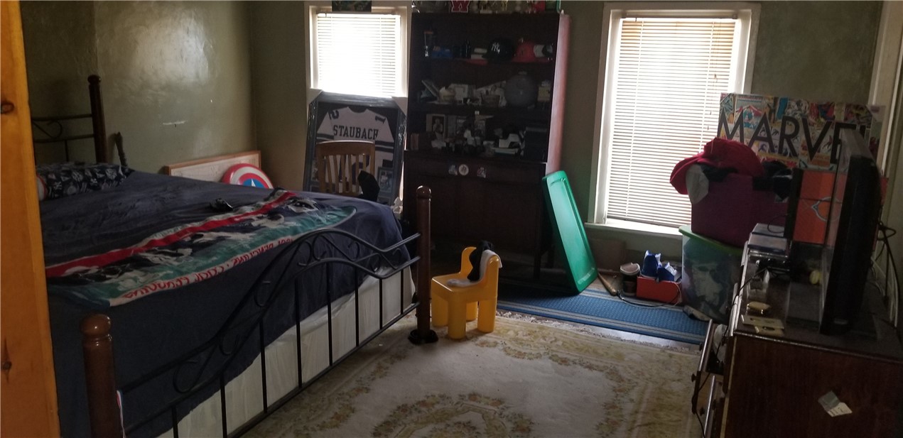 61 Oakman Street Rochester, NY 14605 - Photo 6 of 11 Unit Up Master Bedroom