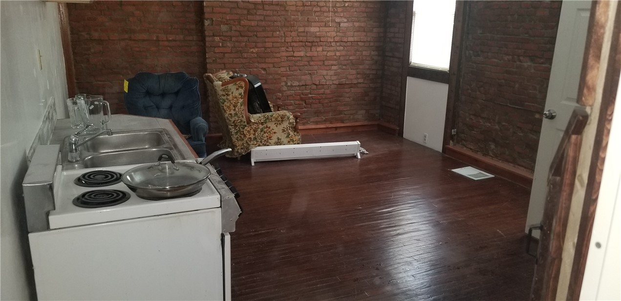 61 Oakman Street Rochester, NY 14605 - Photo 8 of 11 Studio Unit actual size