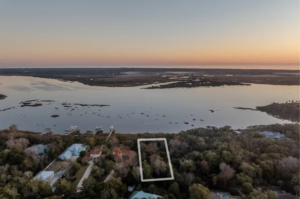an aerial view of beach and ocean