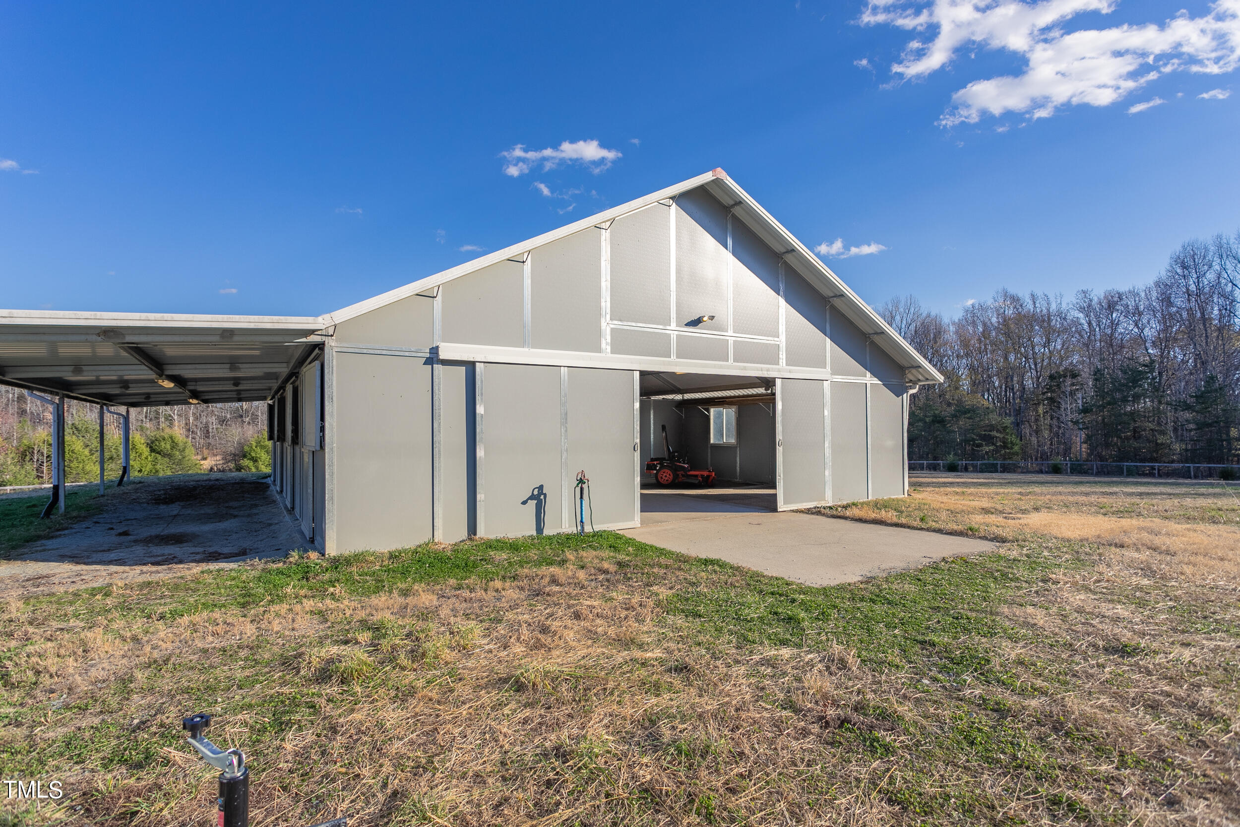 740 Rassie Crabtree Road Rougemont, NC 27572 - Photo 1 of 23 a view of a white house with a yard
