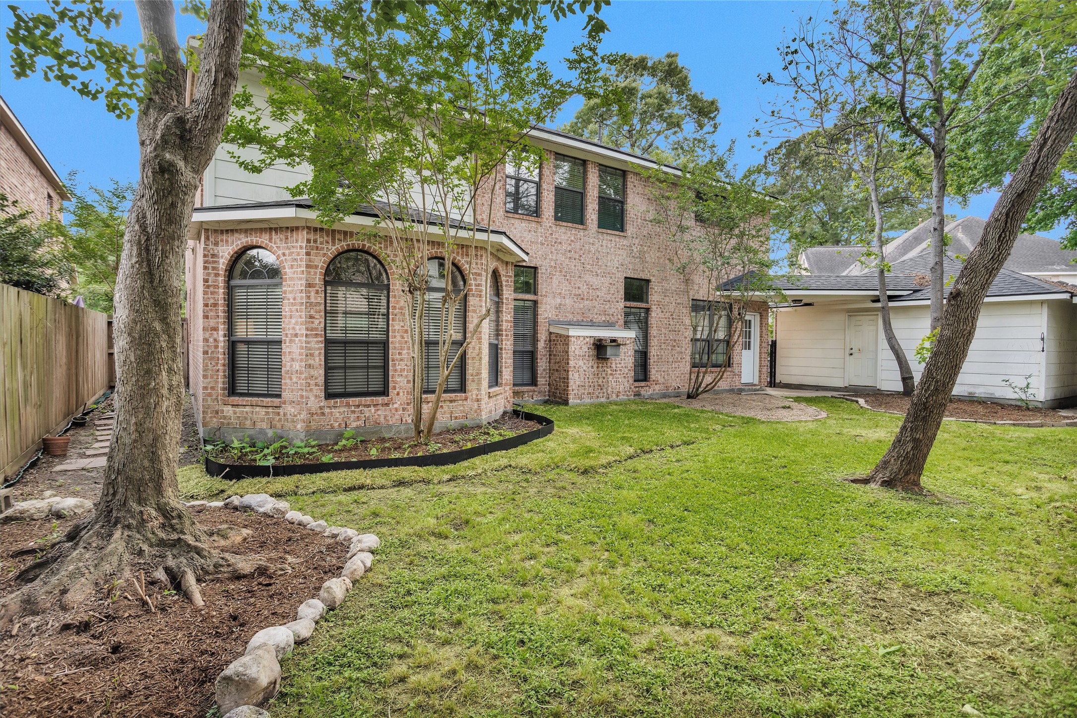 14134 Pollux Court Tomball, TX 77375 - Photo 49 of 50 14134 Pollux features new landscaping front and back