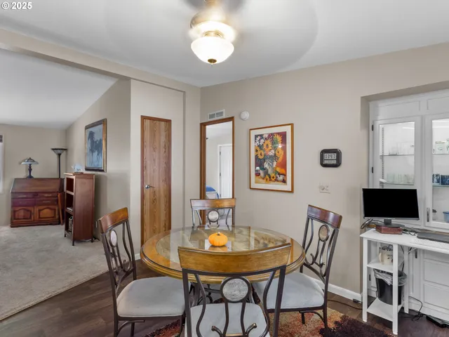 a view of a dining room with furniture