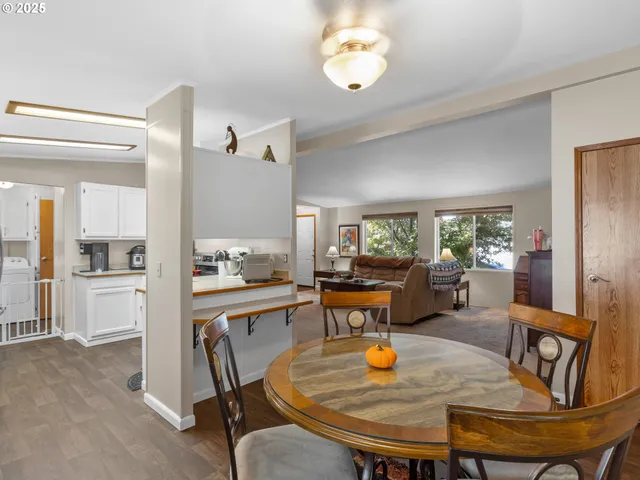 a view of a dining room with furniture