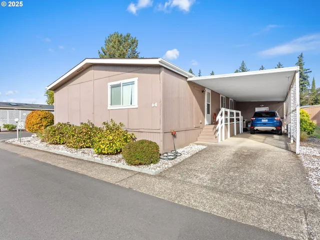 a view of a house with a garage