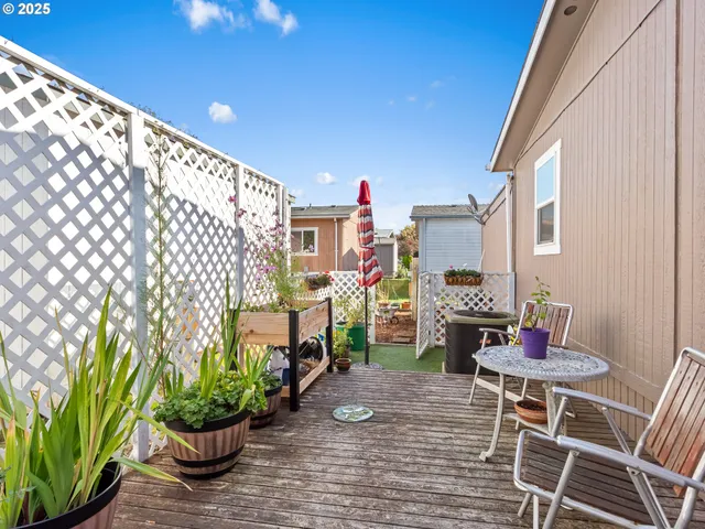 a patio with table and chairs
