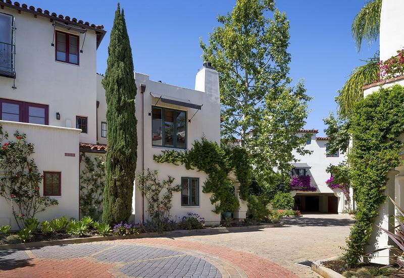 front view of a house with a garden