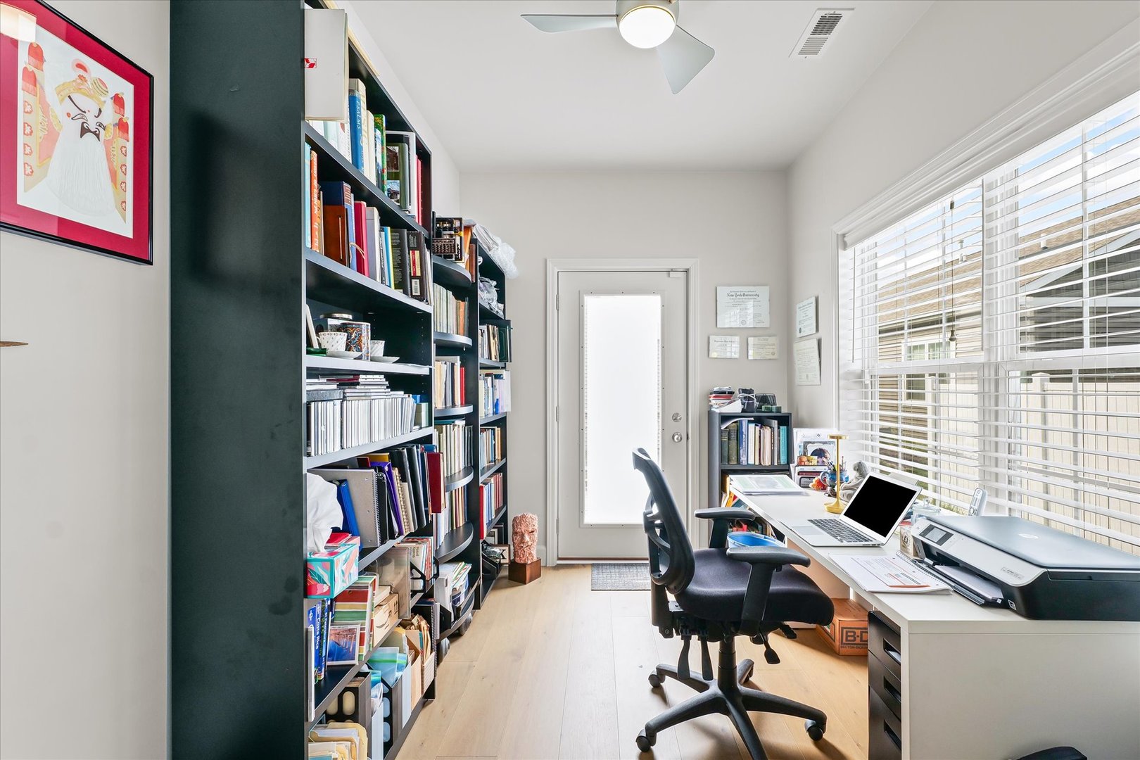 3407 Memory Lane Urbana, IL 61802 - Photo 25 of 30 a view of a workspace with furniture and a bookshelf