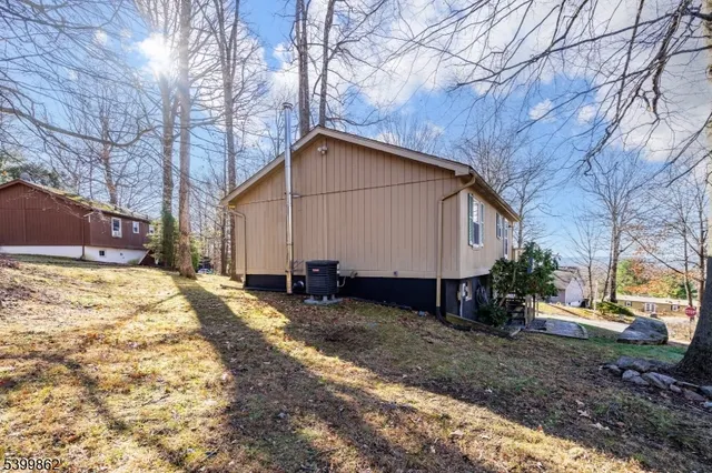 a view of a house with snow on the side of it