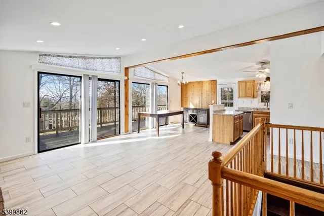 a view of an entryway with wooden floor