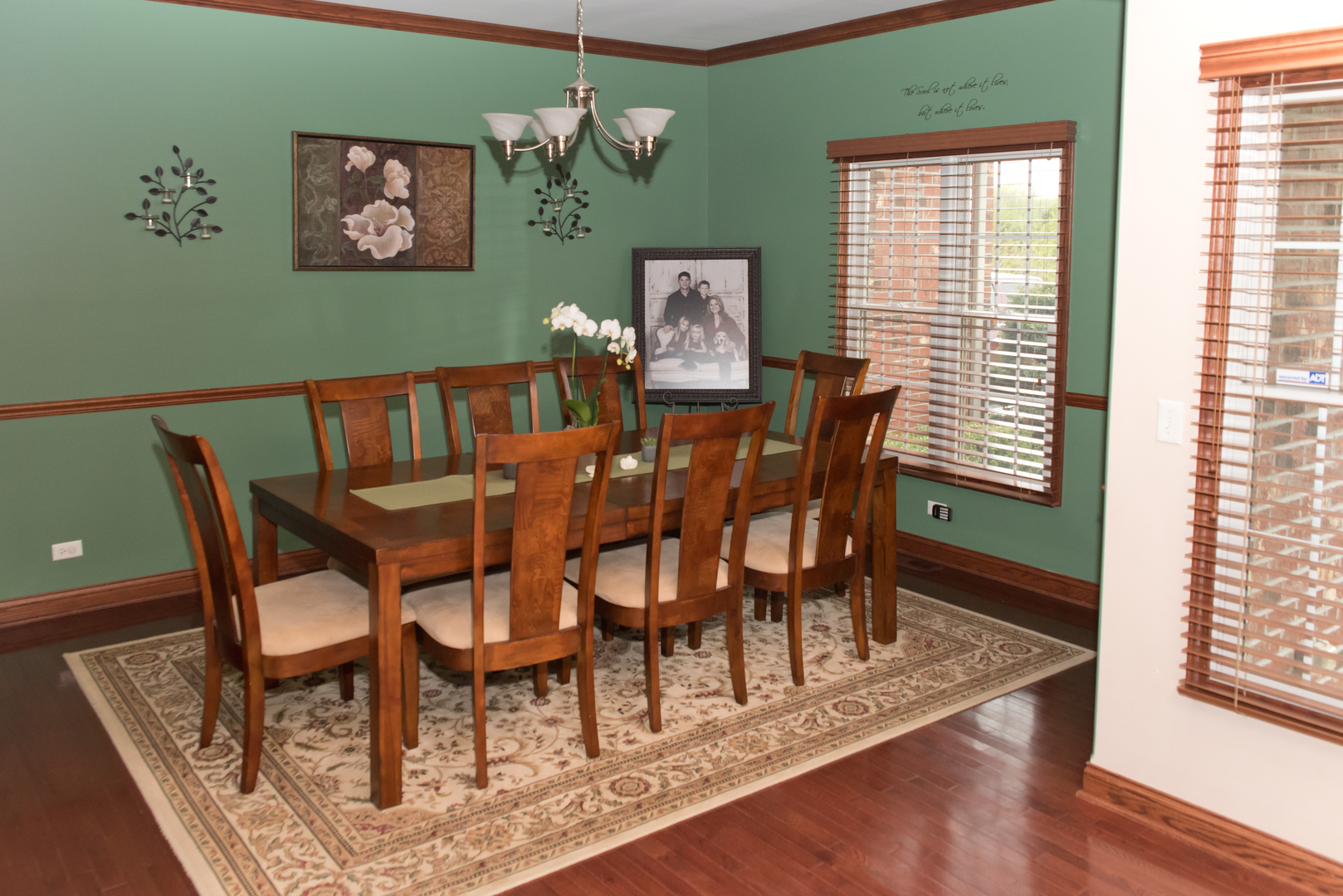 3773 Spring Run Lane Morris, IL 60450 - Photo 6 of 49 a view of a dining room with furniture a chandelier and wooden floor